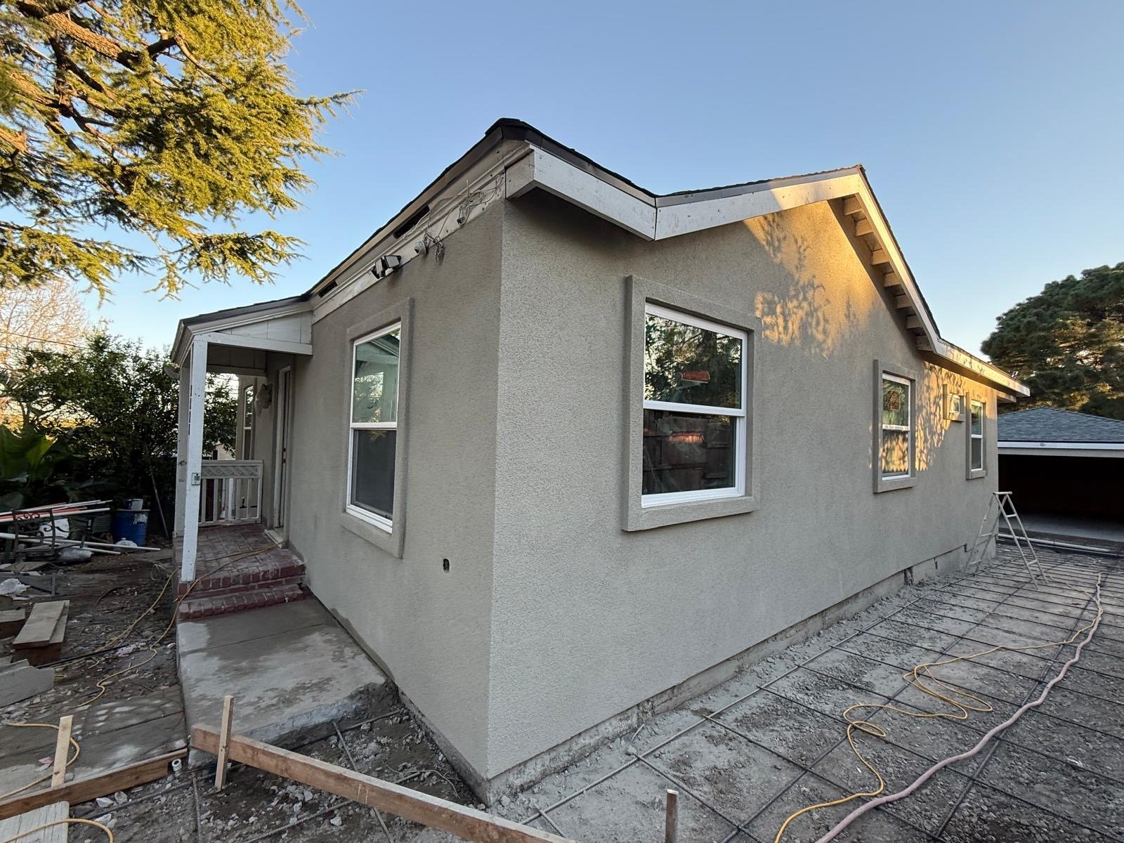 Completed home exterior with finished stucco